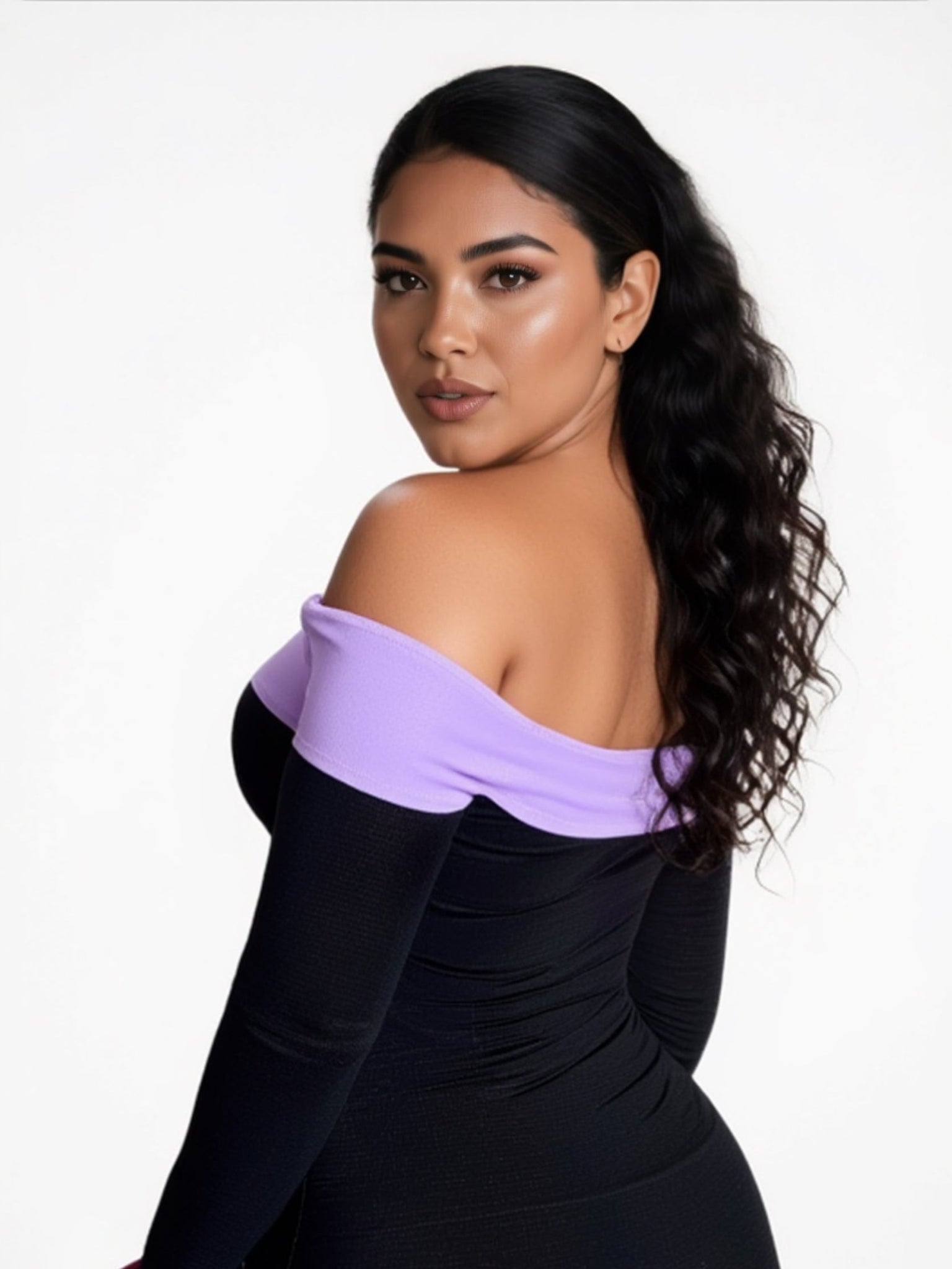 Woman wearing a black and purple off-shoulder dress on a white background